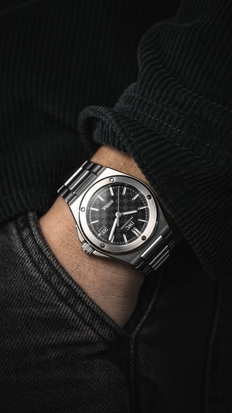 wrist watch, metal watch, stainless steel watch, analog watch, luxury watch, mens watch, brand awareness, lifestyle, editorial, luxurious, calm, neutral, black