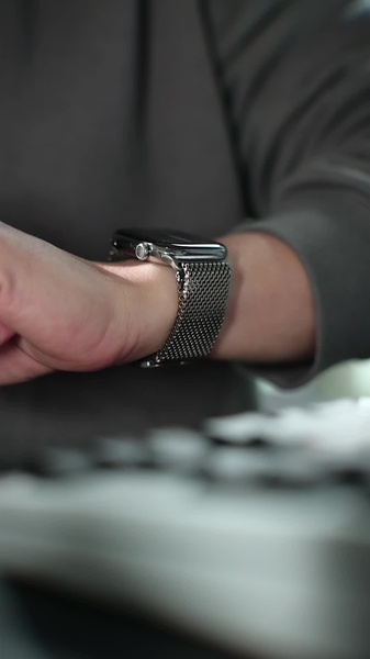 smartwatch, digital watch, wrist watch, steel watch, mesh band watch, product demo, lifestyle, calm, trustworthy, neutral