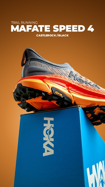 A high-contrast, professional product hero shot of a trail running shoe positioned on top of a branded packaging box.