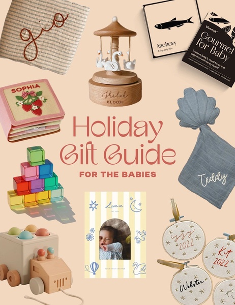 A flat-lay collage featuring various personalized baby accessories, toys, and educational items centered around a holiday gift guide theme.