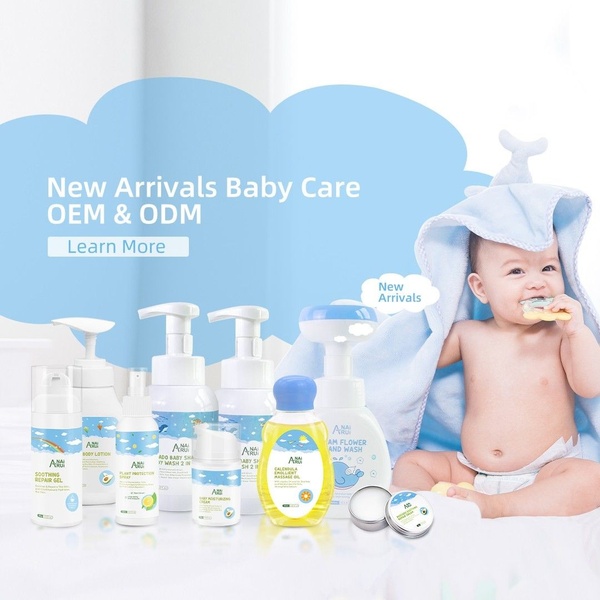 A high-key, minimalist product display showcasing a range of baby skincare products alongside a happy infant in a clean studio setting.