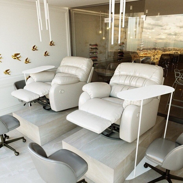 A high-end, clean-aesthetic visual displaying two premium pedicure chairs in a bright, modern salon setting.