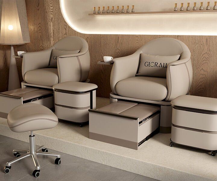 A high-quality, professional-grade pedicure chair set displayed in a clean, neutral-toned salon environment.
