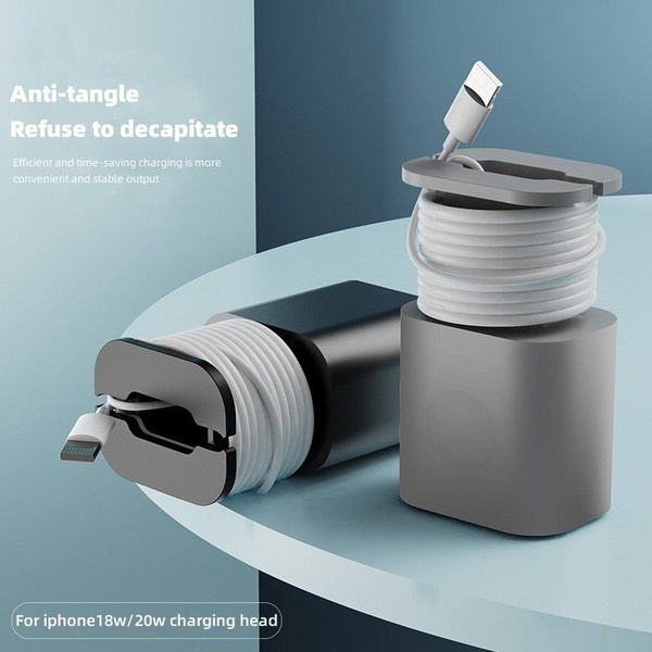 A clean, studio-lit display showcasing a cable organizer mounted on a power adapter, demonstrating immediate utility and aesthetic order.