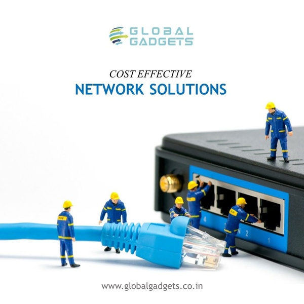 A creative featuring miniature technicians repairing a network switch to demonstrate professional, hands-on network solutions.