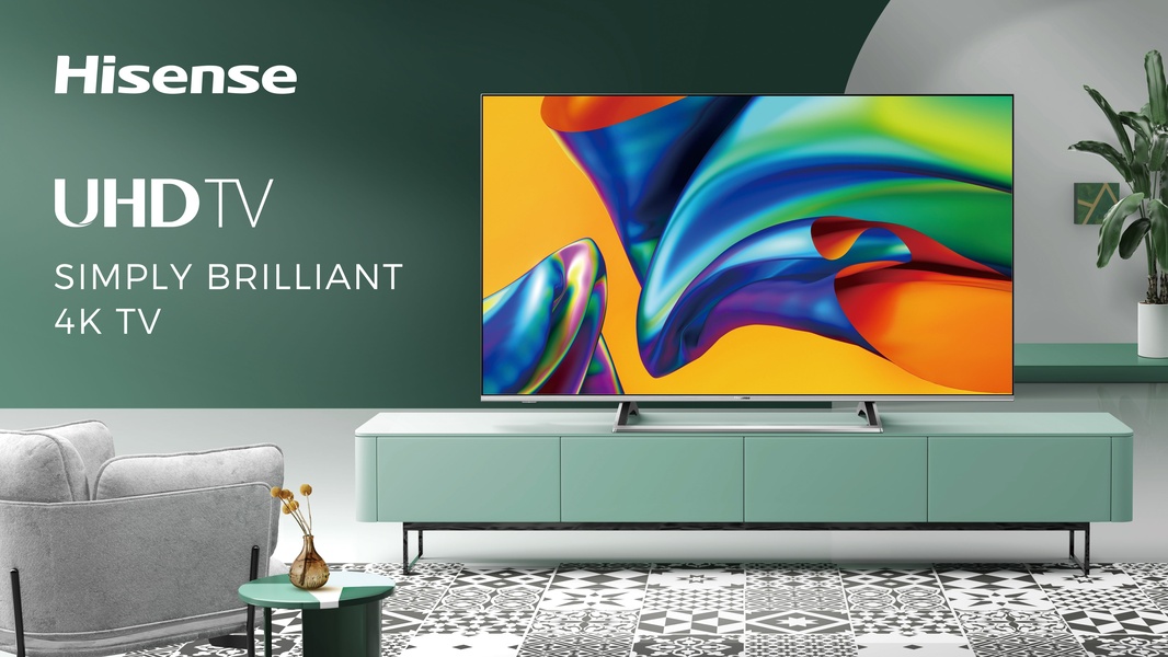 A high-fidelity product ad featuring a 4K TV in a minimalist, modern interior design setting with sharp color contrast.