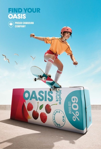 A young skateboarder performs a trick over a giant package of fruit juice, highlighting a bold, energetic, and healthy lifestyle brand image.