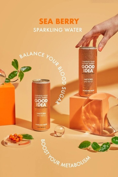 A high-contrast, minimalist studio photograph featuring sparkling water cans with clear, bold typography highlighting health benefits.