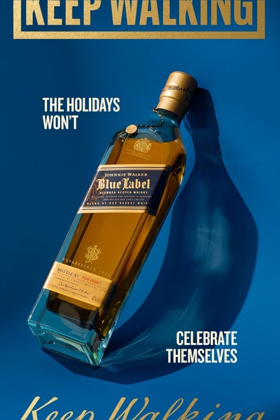 A high-end product showcase for Scotch whisky featuring a minimalist, high-contrast, professional studio aesthetic with bold, seasonal copy.