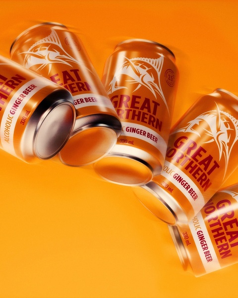 A high-energy, 4:5 ratio hero shot featuring multiple ginger beer cans floating against a vibrant orange backdrop, emphasizing brand visibility.