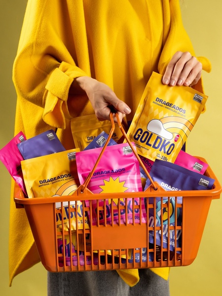 chocolate candy, chocolate covered nuts, candy snacks, chocolate pouches, sweet snacks, bestseller push, lifestyle, energetic, playful, yellow, pink, purple