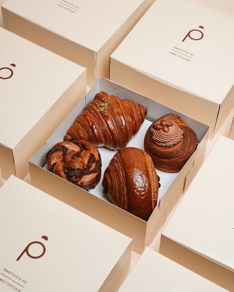 pastry box, baked goods, assorted pastries, bakery treats, croissant box, bestseller push, minimalist, flat lay, calm, luxurious, neutral, brown