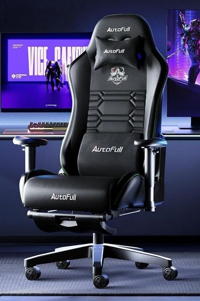 A high-contrast, studio-quality product shot of a black gaming chair positioned in a dimly lit, immersive gaming environment.