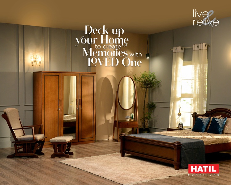 A warm, aspirational bedroom scene featuring a wooden bed, wardrobe, and vanity that targets emotional home improvement.