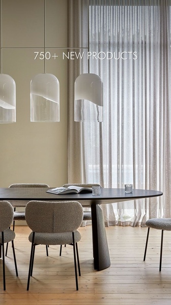 A high-end, clean interior photography shot featuring three glass pendant lights hanging over a modern dining table with an overlay of a bulk product offer.