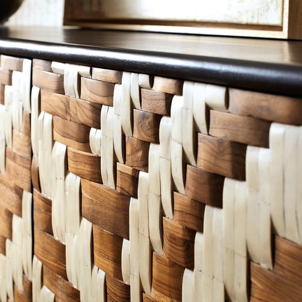 A close-up, high-detail macro shot of a woven wooden cabinet door showcasing complex textures and artisanal quality.