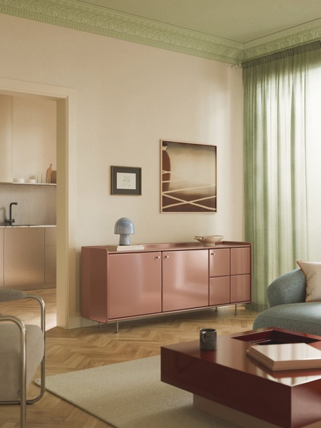 A high-quality, moody product hero shot of a modern sideboard integrated into a sophisticated, earth-toned interior.