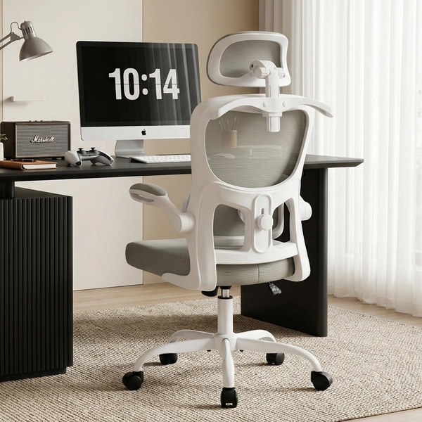A high-quality, bright, and clean product hero shot of an ergonomic mesh office chair in a modern home office workspace.