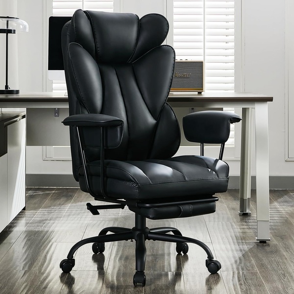 A high-quality, studio-style shot of a black ergonomic office chair set in a bright, modern office space.