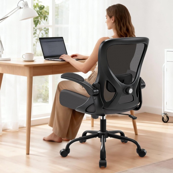 A high-quality, professional photograph showing a woman working at a bright desk, highlighting the ergonomic chair's design and back support.
