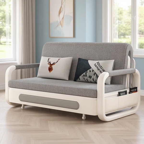 A high-quality, static image of a grey sofa bed in a bright, modern room. The creative emphasizes product utility and interior design harmony.