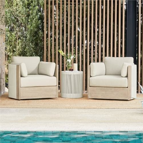 A high-end square composition featuring two modern outdoor lounge chairs and a matching side table set against a slatted wood background and pool edge.