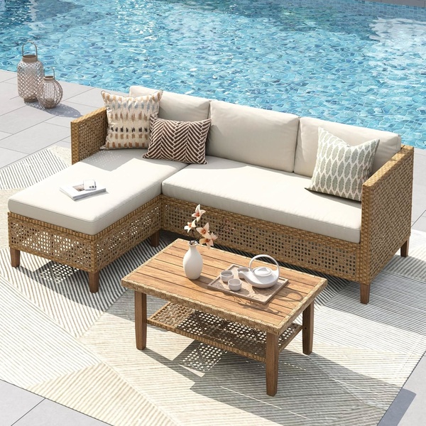 A high-end, bright, and aspirational product hero shot featuring an L-shaped wicker sectional sofa set on a poolside patio.