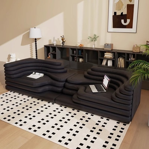 A high-end sectional sofa captured in a serene, modern living room setting designed to evoke comfort and aspiration.