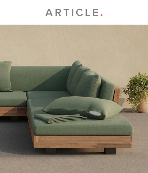 A high-quality, static image of an outdoor sectional sofa set against a neutral, warm background that highlights texture and premium design.