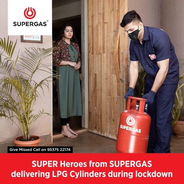 This ad features a professional delivery person handing over an LPG cylinder to a customer at a residential door, emphasizing reliable essential service.