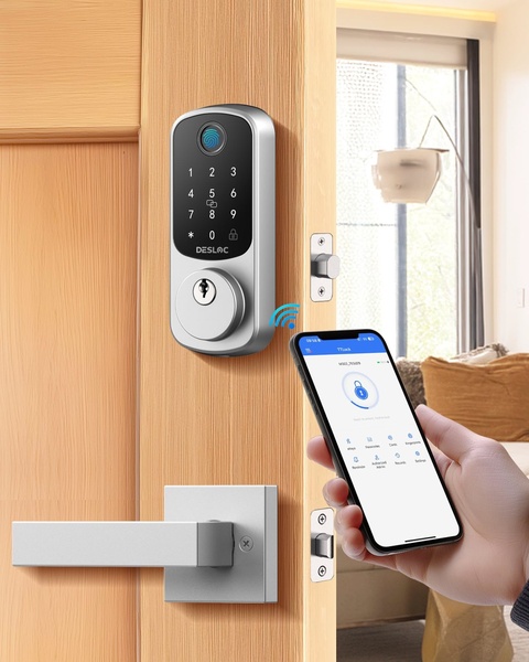 A close-up shot showing a smartphone app interface interacting wirelessly with a modern smart door lock installed on a wooden door.