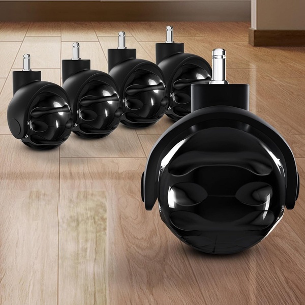 A clean, high-resolution product shot of five replacement office chair casters arranged on a wooden floor to emphasize product quality and durability.