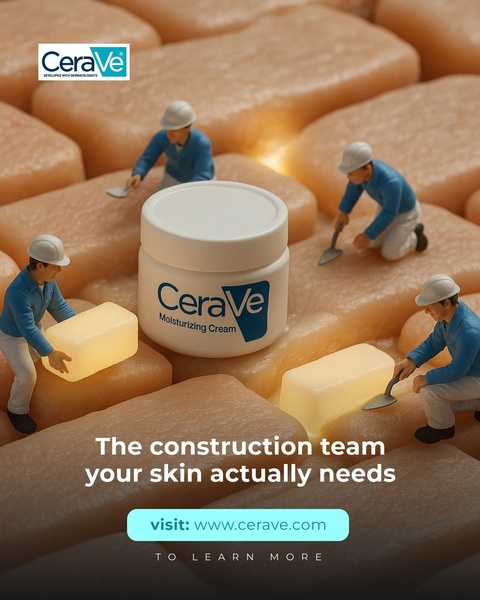 An ad creative showing miniature workers assembling blocks of cream to form a smooth surface, representing skin barrier repair.