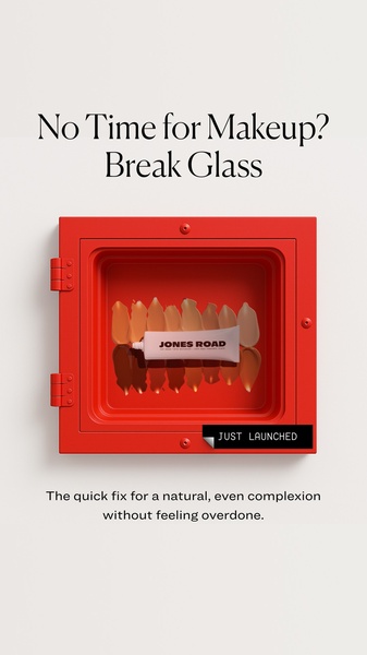 A clever emergency-themed creative featuring a tube of Jones Road beauty balm inside a break-glass fire box to represent a quick fix for makeup.