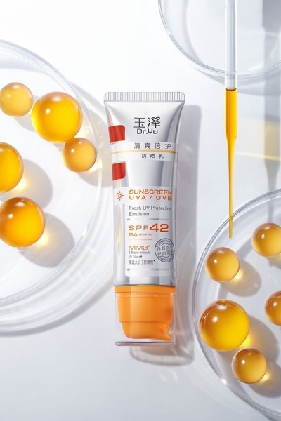 sunscreen, spf lotion, uv protection cream, sun protection emulsion, face sunscreen, sunblock cream, product launch, brand awareness, minimalist, flat lay, fresh, trustworthy, neutral, orange, yellow