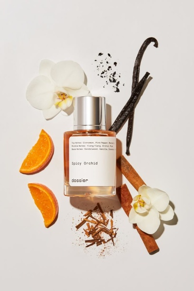 perfume, eau de parfum, fragrance spray, cologne, body fragrance, scent bottle, product launch, brand awareness, flat lay, minimalist, warm, calm, neutral, orange, brown