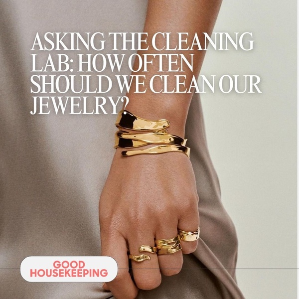 A close-up, lifestyle-focused image featuring elegant gold bracelets and rings, using an editorial-style headline to establish authority on jewelry care.