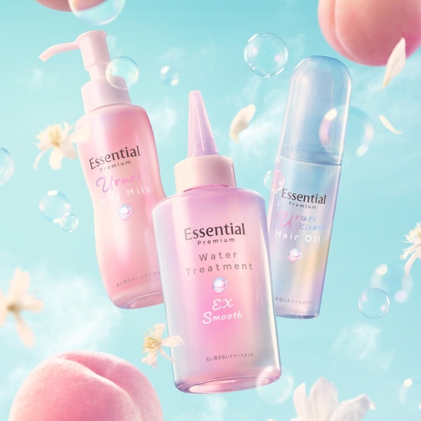 A high-key product showcase featuring Essential Premium hair treatments floating in a dreamy, pastel-toned environment with bubbles and peach motifs.