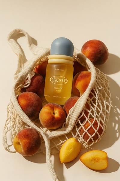 hand oil, hand moisturizer, skincare oil, nourishing hand oil, hand treatment, new arrival, minimalist, flat lay, fresh, calm, neutral, orange, yellow