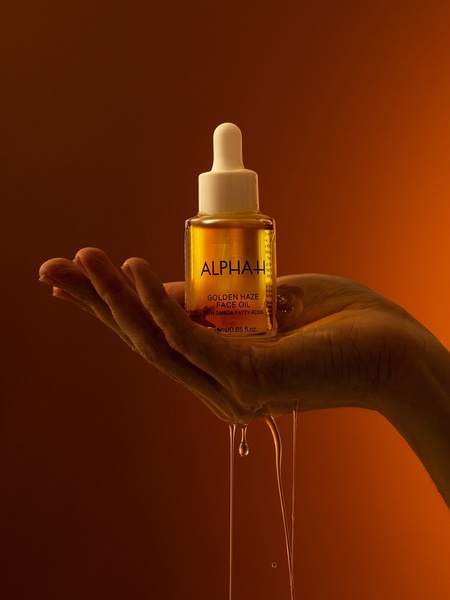 face oil, facial serum, skincare oil, beauty serum, skin oil, bestseller push, lifestyle, minimalist, luxurious, warm, orange, gold