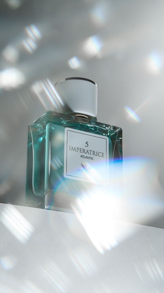 perfume, cologne, fragrance, eau de parfum, scent, brand awareness, minimalist, editorial, calm, luxurious, neutral, blue