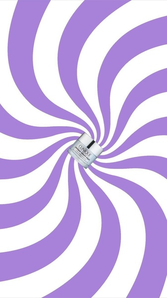A hypnotic, purple and white spiral pattern creates a motion-heavy background that forces the viewer to focus on the centered jar of night cream.