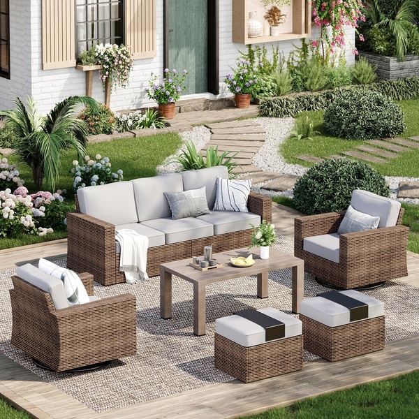 A high-quality 1:1 image showcasing a complete patio furniture set arranged on a rug, designed to evoke a luxury outdoor lifestyle.
