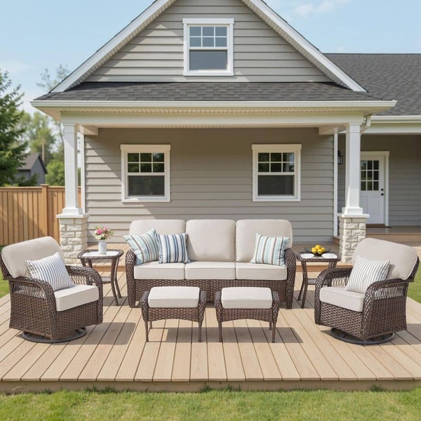 A high-quality 1:1 image featuring a complete outdoor wicker furniture set arranged on a wooden deck, conveying comfort and an inviting home atmosphere.
