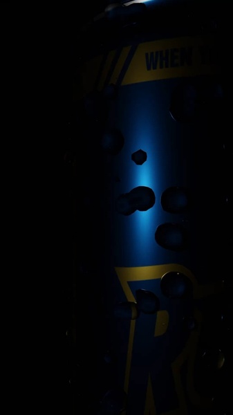 A high-contrast, moody close-up of an energy drink can featuring water droplets and sharp lighting to emphasize product texture.