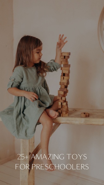 A soft-focus lifestyle image of a young child stacking wooden blocks in a muted, neutral-toned room with centered text.