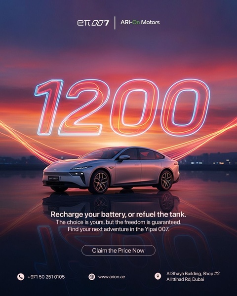 An electric sedan is showcased against a vibrant sunset background with the range figure 1200 emphasized in neon-style typography.