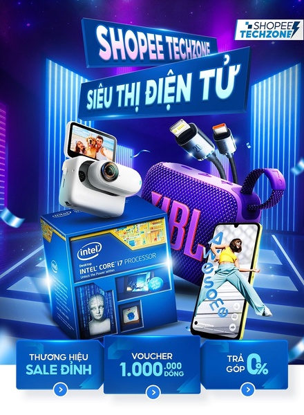 A high-energy, neon-themed promotional creative featuring a computer processor, a wireless speaker, and a smartphone displayed against a dark, futuristic background.