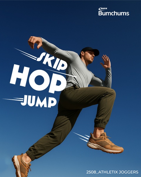 Vertical activewear ad of a model in olive joggers captured mid-air against a clear blue sky with large bold sans-serif text over the image