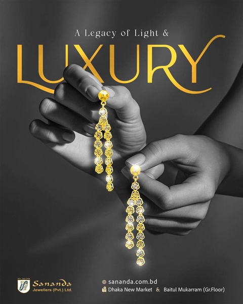 A high-end, minimalist advertisement featuring gold dangling earrings held by elegant hands against a dark, moody background.